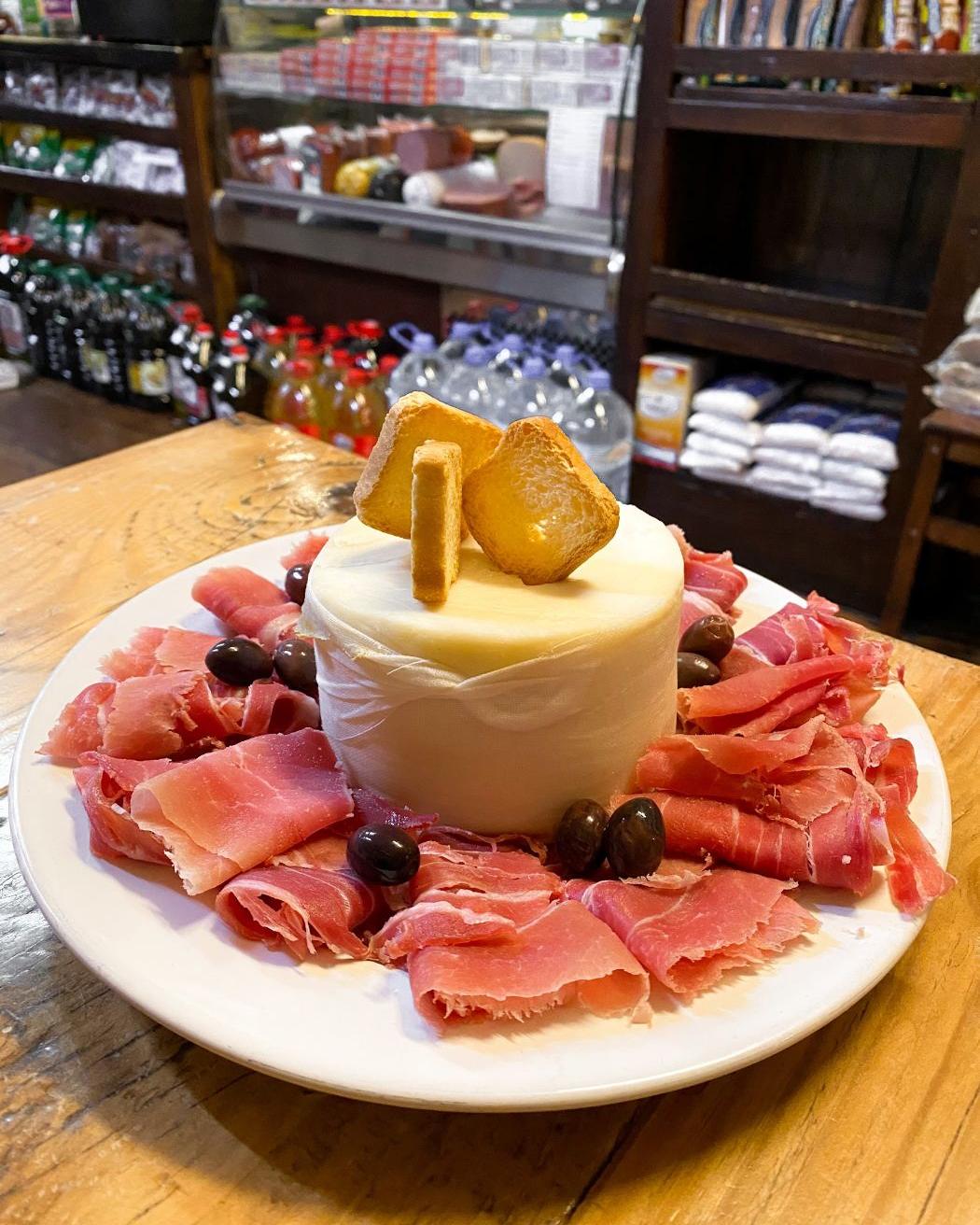 A plate of Portuguese presunto with cheese